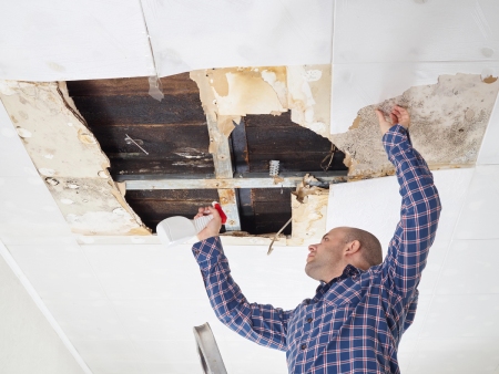 man-fixing-a-roof